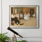 Impressionist dance class interior scene by Edgar Degas in an ornate champagne frame displayed in a light-toned interior setting.