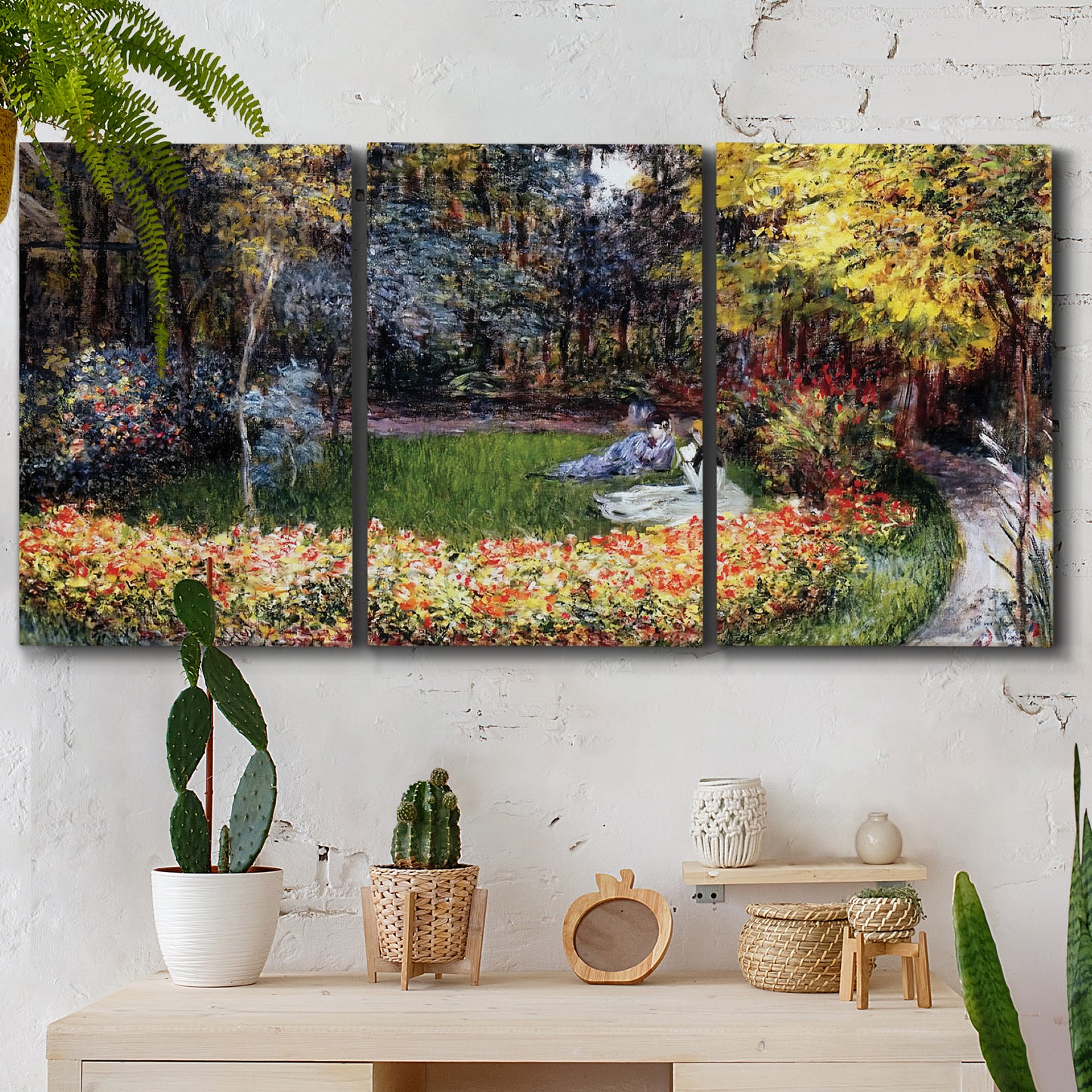 Three-panel canvas wall art featuring garden in full bloom by coast, displayed in a boho-chic entryway above a console table.