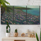 Three-panel canvas wall art featuring calm coastal landscape sanctuary, displayed in a boho-chic entryway above a console table.