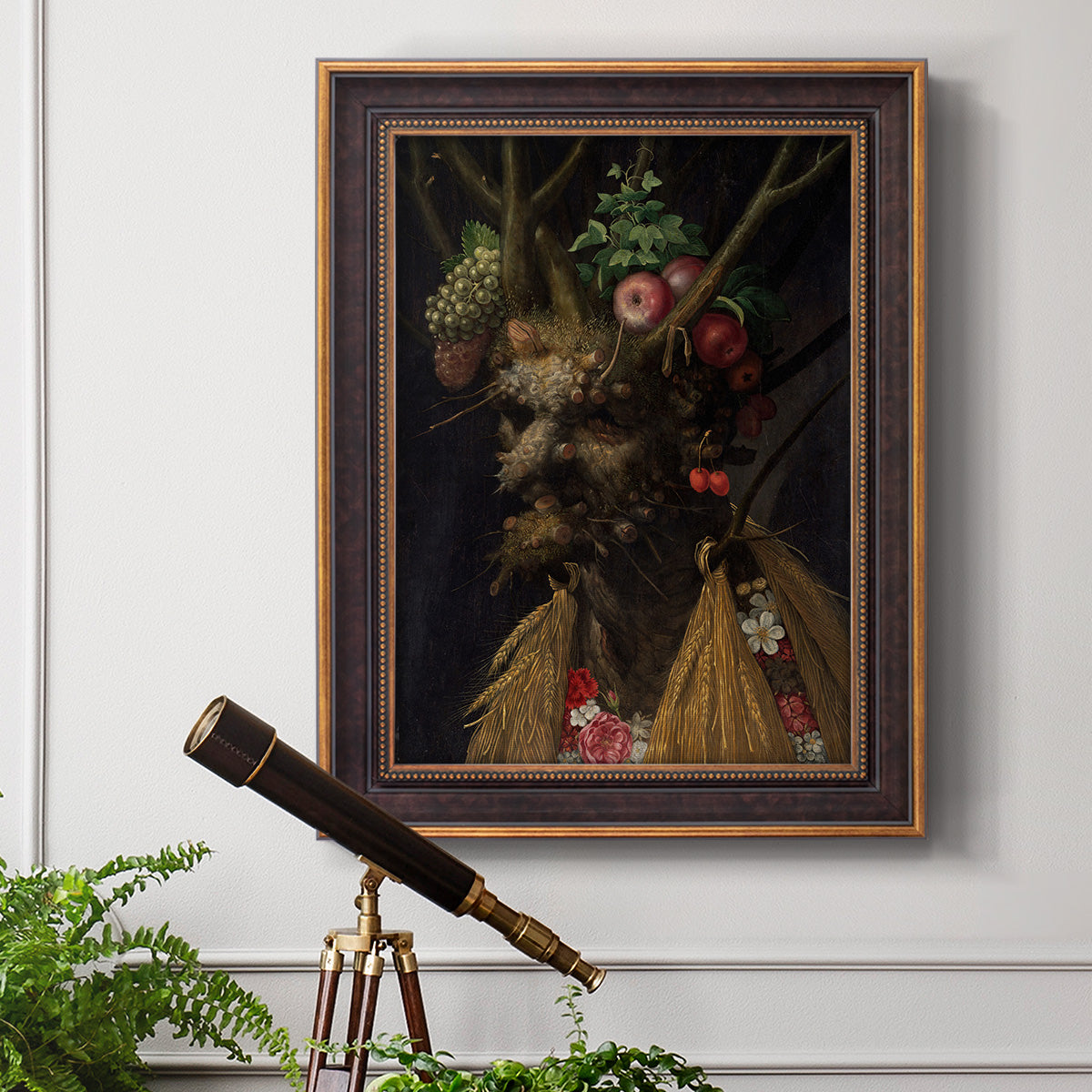 Surreal allegorical portrait representing the four seasons by Giuseppe Arcimboldo in an ornate bronzed mahogany wood frame displayed in a light-toned interior setting.