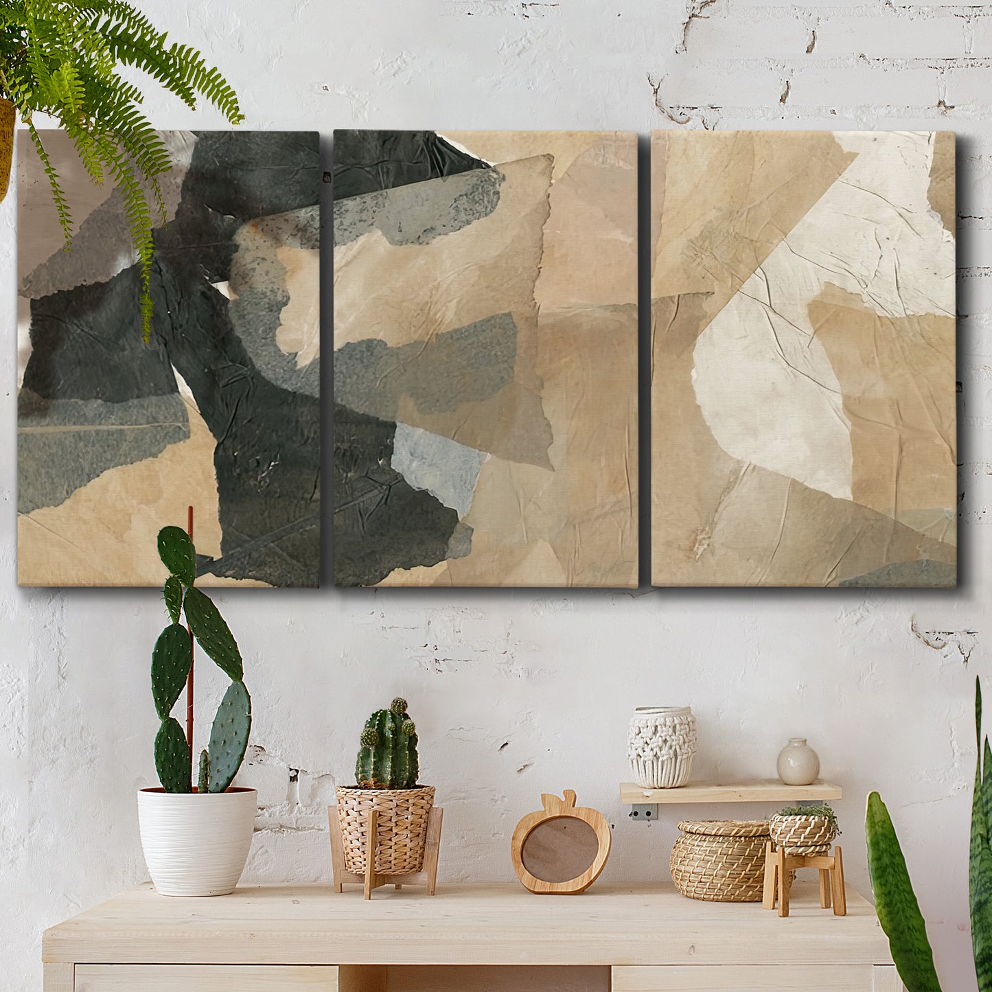 Three-panel canvas wall art featuring blurred mixed media abstract collage, displayed in a boho-chic entryway above a console table.