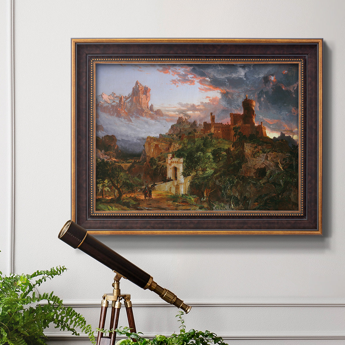 Romantic allegorical landscape painting by Jasper Francis Cropsey in an ornate bronzed mahogany wood frame displayed in a light-toned interior setting.