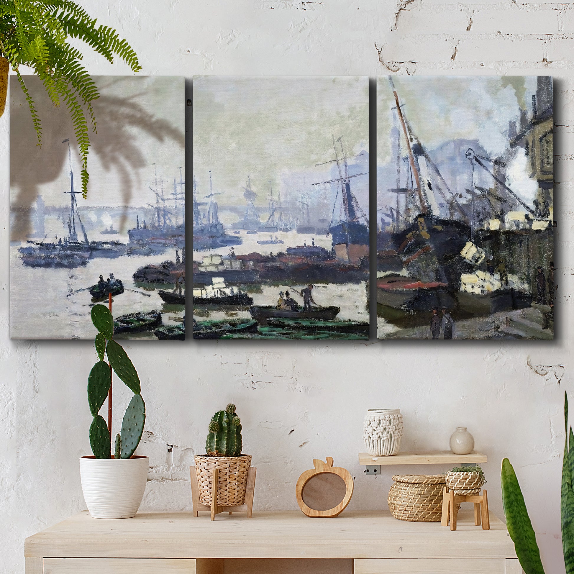 Three-panel canvas wall art featuring working harbor with docked boats, displayed in a boho-chic entryway above a console table.