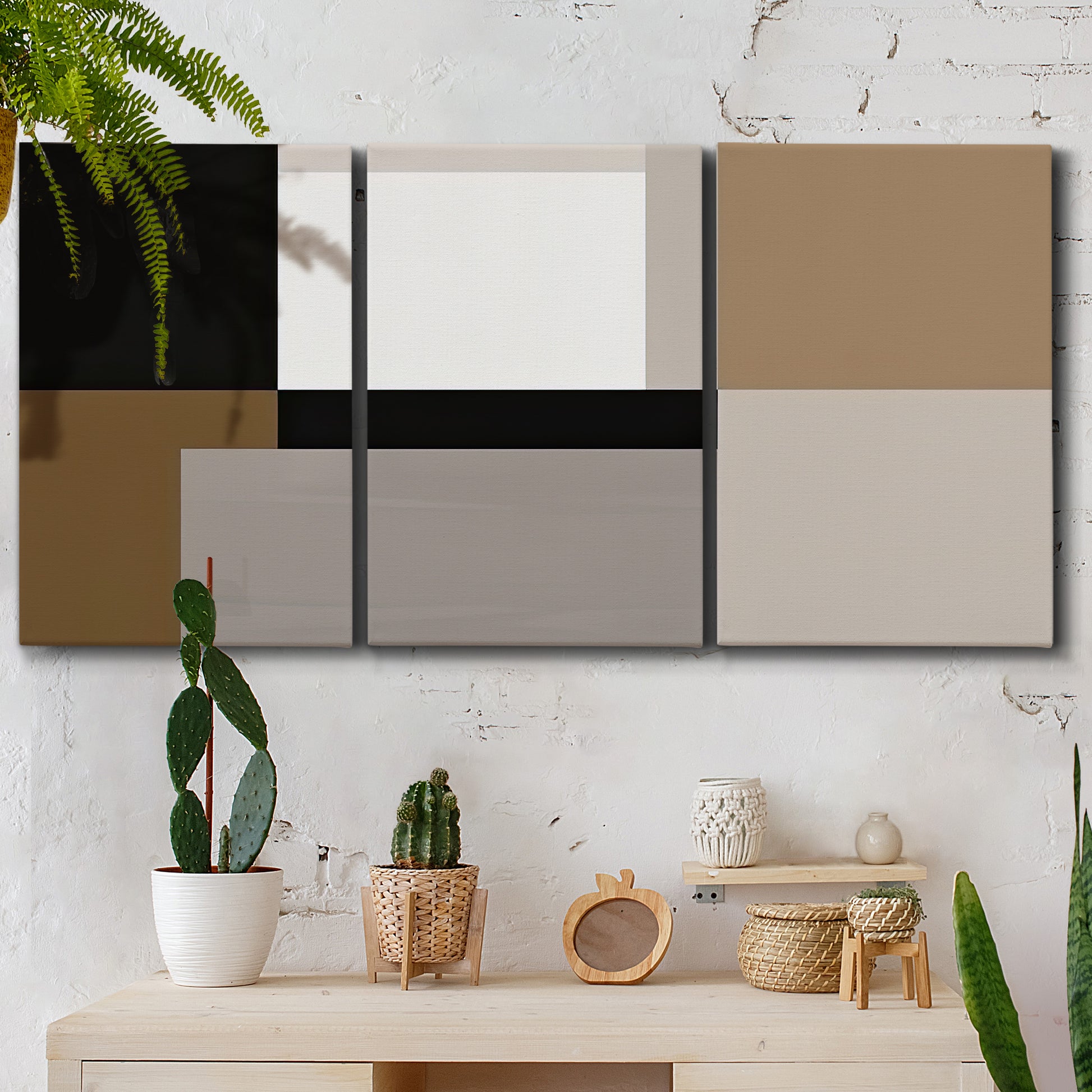 Three-panel canvas wall art featuring geometric abstract centerpoint composition, displayed in a boho-chic entryway above a console table.