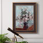 Impressionist chrysanthemum floral painting by Claude Monet in an ornate bronzed mahogany wood frame displayed in a light-toned interior setting.