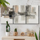 Three-panel canvas wall art featuring urban abstract watercolor oasis, displayed in a boho-chic entryway above a console table.