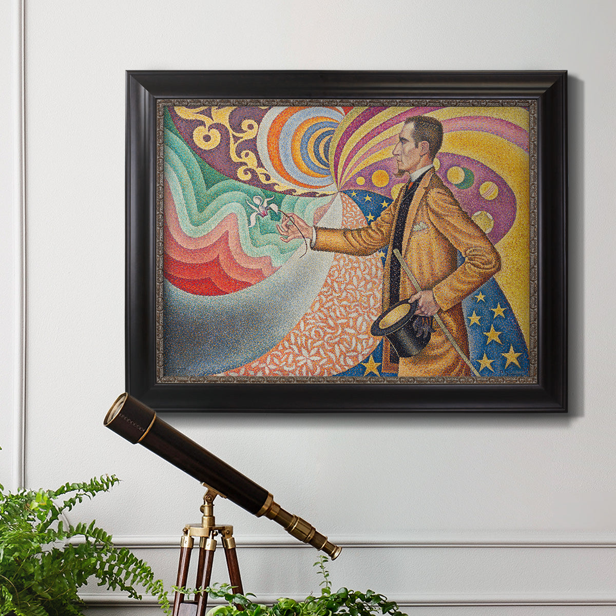 Neo-impressionist abstract portrait by Paul Signac in an ornate black frame with gilded inner detail displayed in a light-toned interior setting.