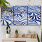 Three-panel canvas wall art featuring geometric abstract bowl forms, displayed in a boho-chic entryway above a console table.