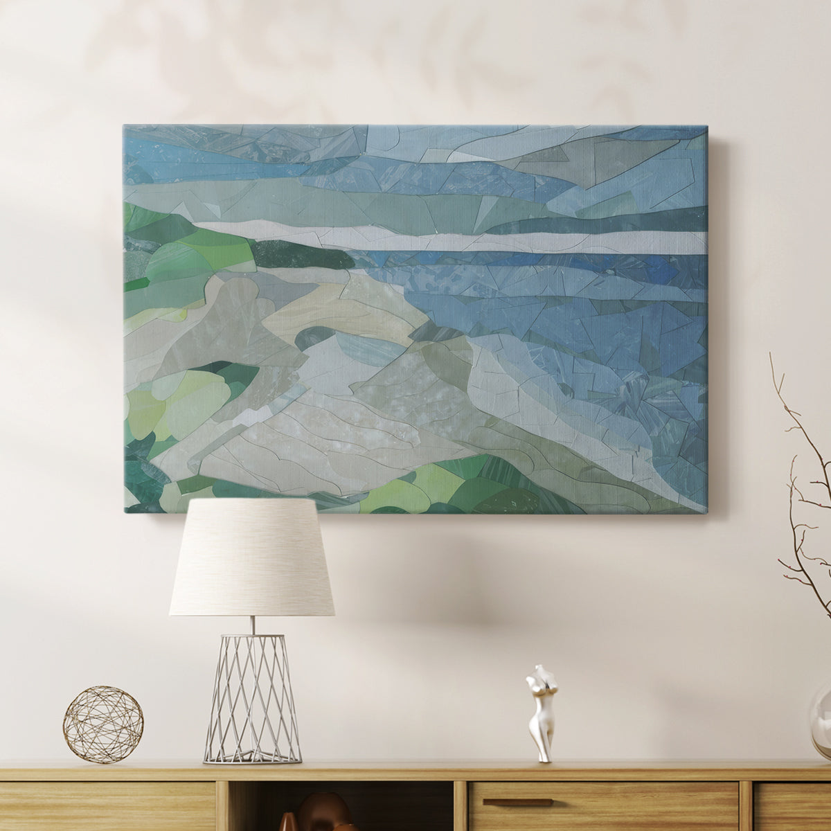 Colorful geometric landscape artwork depicting a coastal view with blue waters and green hills during daytime