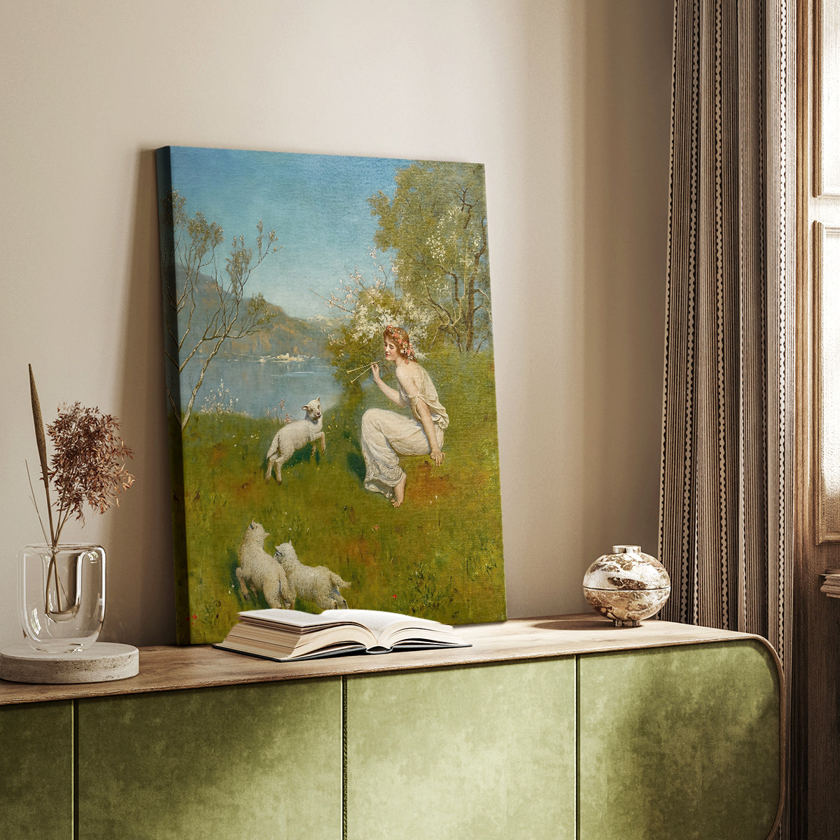 Canvas art print of a female figure and lambs in a forest clearing with greenery and warm tones styled in a home decor setting.