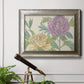 Contemporary peony flower illustration in an ornate mottled silver frame displayed in a light-toned interior setting.