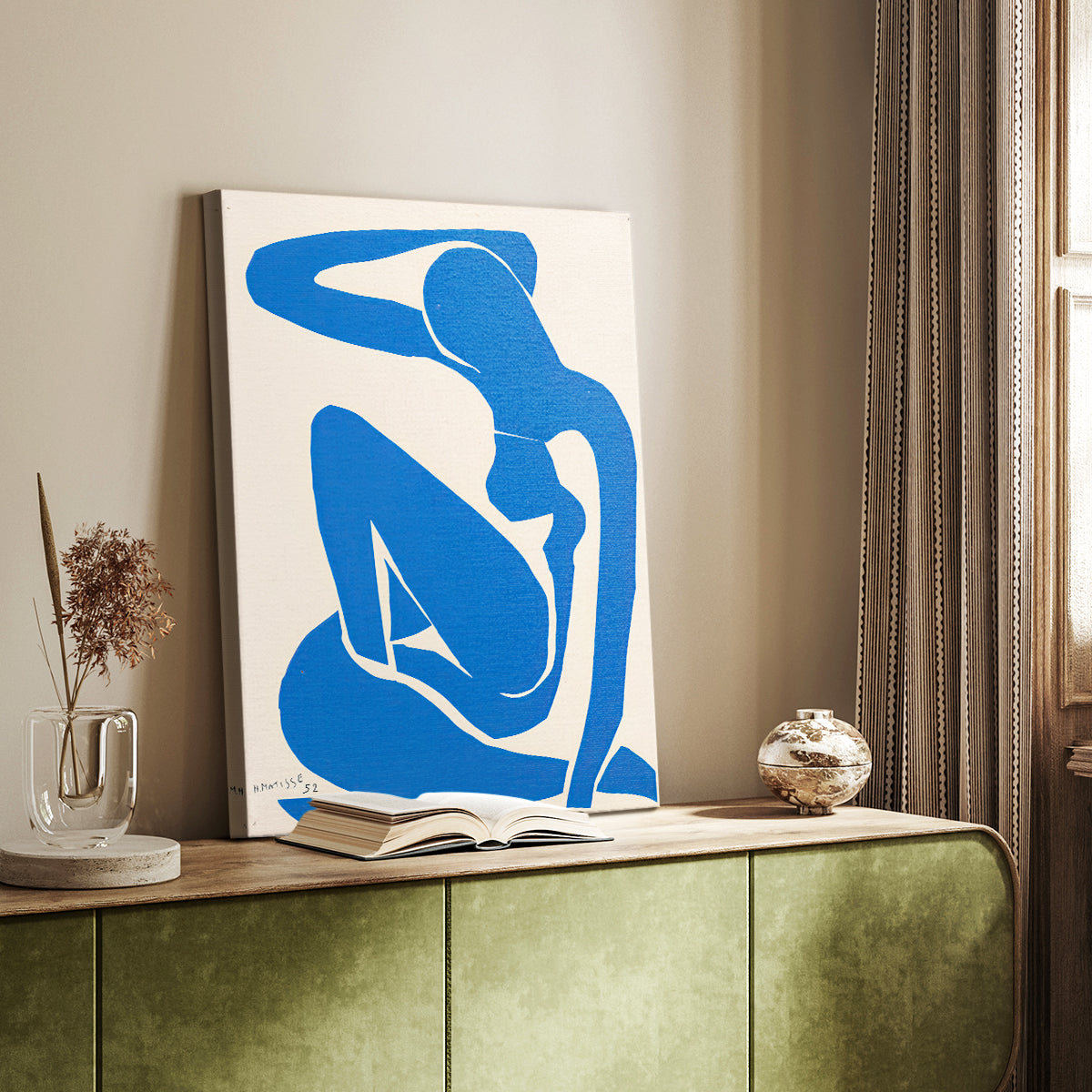 Canvas art print of a stylized body formed from flat geometric pieces styled in a home decor setting.
