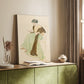 Canvas art print of a calm figure with book and gentle tones styled in a home decor setting.
