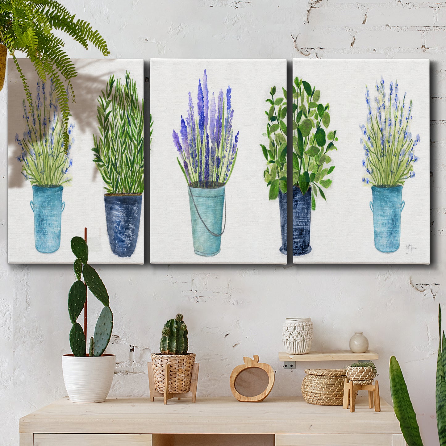 Three-panel canvas wall art featuring minimal monochrome abstract forms, displayed in a boho-chic entryway above a console table.