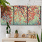 Three-panel canvas wall art featuring autumn foliage landscape photograph, displayed in a boho-chic entryway above a console table.