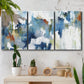 Three-panel canvas wall art featuring flowing abstract color movement, displayed in a boho-chic entryway above a console table.