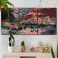 Three-panel canvas wall art featuring rugged canyon landscape with wildlife, displayed in a boho-chic entryway above a console table.