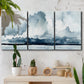 Three-panel canvas wall art featuring abstract rainstorm watercolor, displayed in a boho-chic entryway above a console table.
