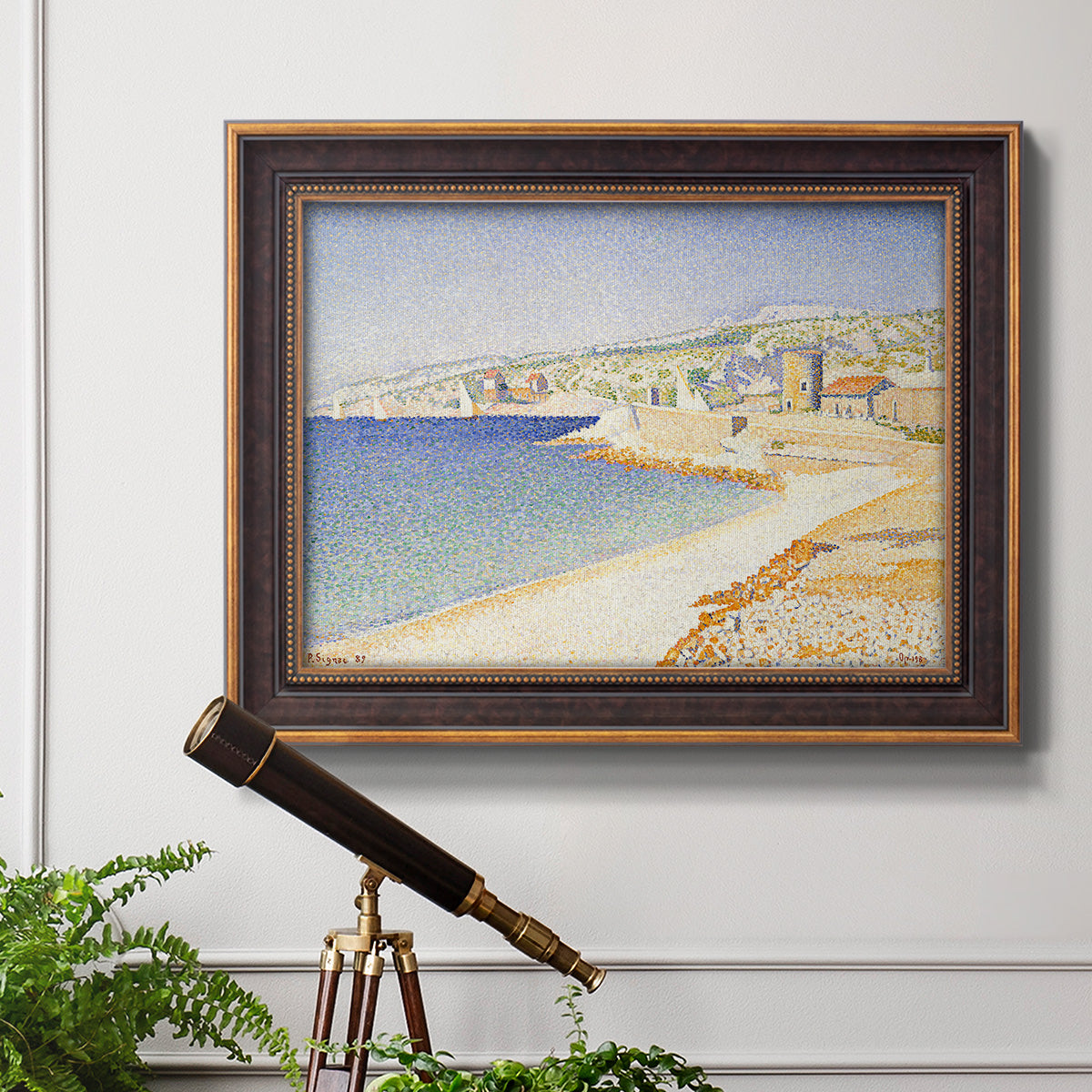Impressionist Mediterranean jetty seascape by Paul Signac in an ornate bronzed mahogany wood frame displayed in a light-toned interior setting.