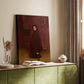 Canvas art print of a musical setting with a figure and instrument in warm tones styled in a home decor setting.