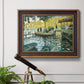 Impressionist riverside leisure scene by Claude Monet in an ornate bronzed mahogany wood frame displayed in a light-toned interior setting.