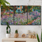 Three-panel canvas wall art featuring blooming irises in garden bed, displayed in a boho-chic entryway above a console table.