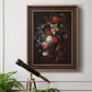 Classical floral still life painting by Jan van Huysum in an ornate bronzed mahogany wood frame displayed in a light-toned interior setting.