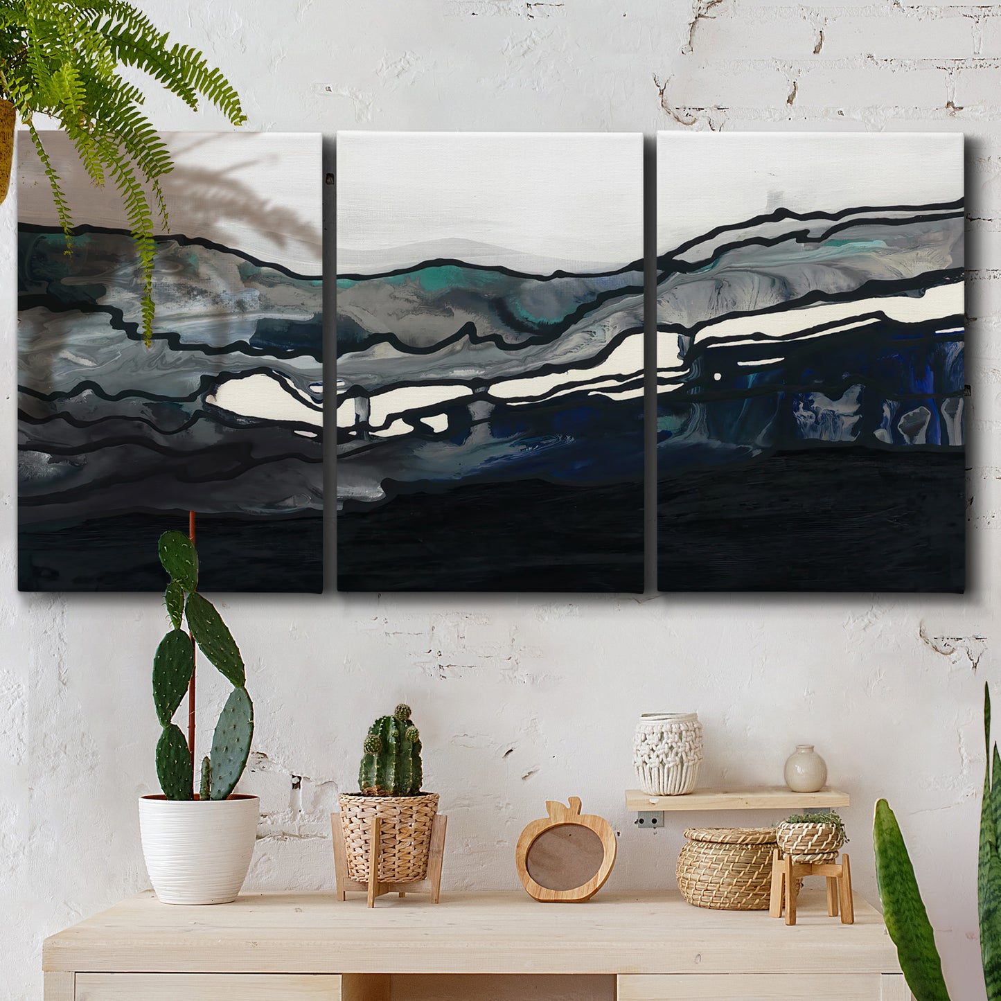 Three-panel canvas wall art featuring abstract passage of time composition, displayed in a boho-chic entryway above a console table.
