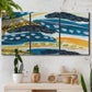 Three-panel canvas wall art featuring feather inspired abstract linear motion, displayed in a boho-chic entryway above a console table.