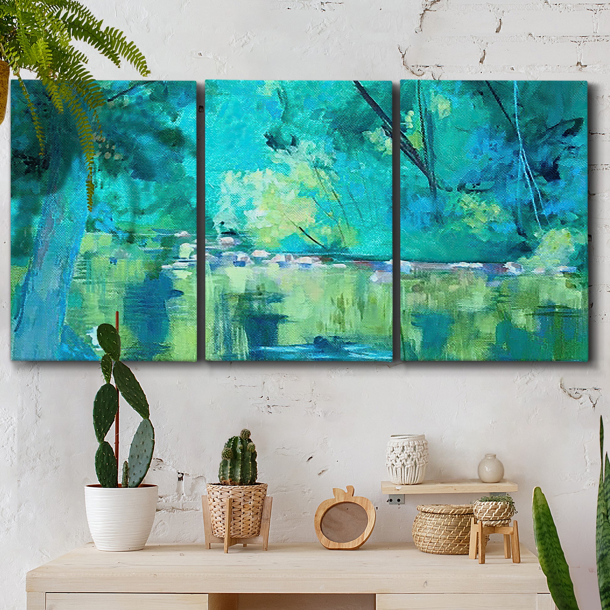 Three-panel canvas wall art featuring abstract river composition with movement, displayed in a boho-chic entryway above a console table.