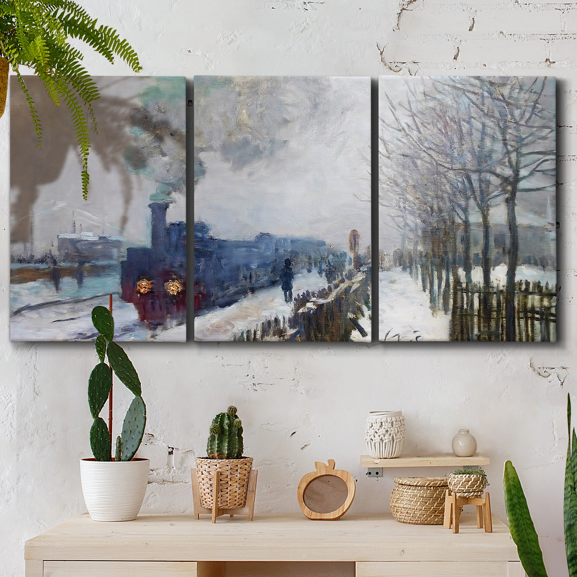 Three-panel canvas wall art featuring steam train in snowy landscape, displayed in a boho-chic entryway above a console table.