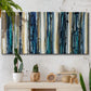 Three-panel canvas wall art featuring vertical blue abstract streaks, displayed in a boho-chic entryway above a console table.