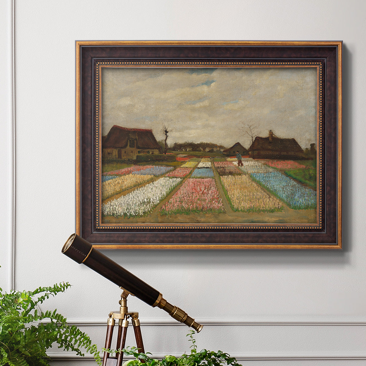 Impressionist Dutch bulb field landscape by Vincent van Gogh in an ornate bronzed mahogany wood frame displayed in a light-toned interior setting.