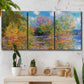 Three-panel canvas wall art featuring wide river landscape, displayed in a boho-chic entryway above a console table.