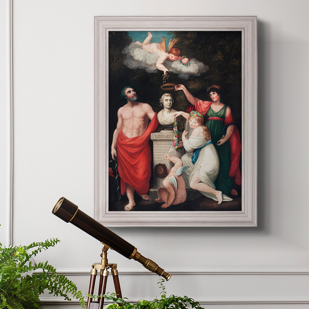 Classical allegorical painting honoring Linnaeus by Robert John Thornton in an ornate weathered white frame displayed in a light-toned interior setting.