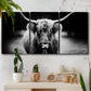 Three-panel canvas wall art featuring black and white cattle portrait, displayed in a boho-chic entryway above a console table.