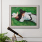 Impressionist outdoor portrait of two girls by John Singer Sargent in an ornate weathered white frame displayed in a light-toned interior setting.