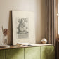 Canvas art print of a classical figure rendered in fine etched lines and simple background styled in a home decor setting.