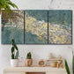 Three-panel canvas wall art featuring soft abstract wind movement, displayed in a boho-chic entryway above a console table.