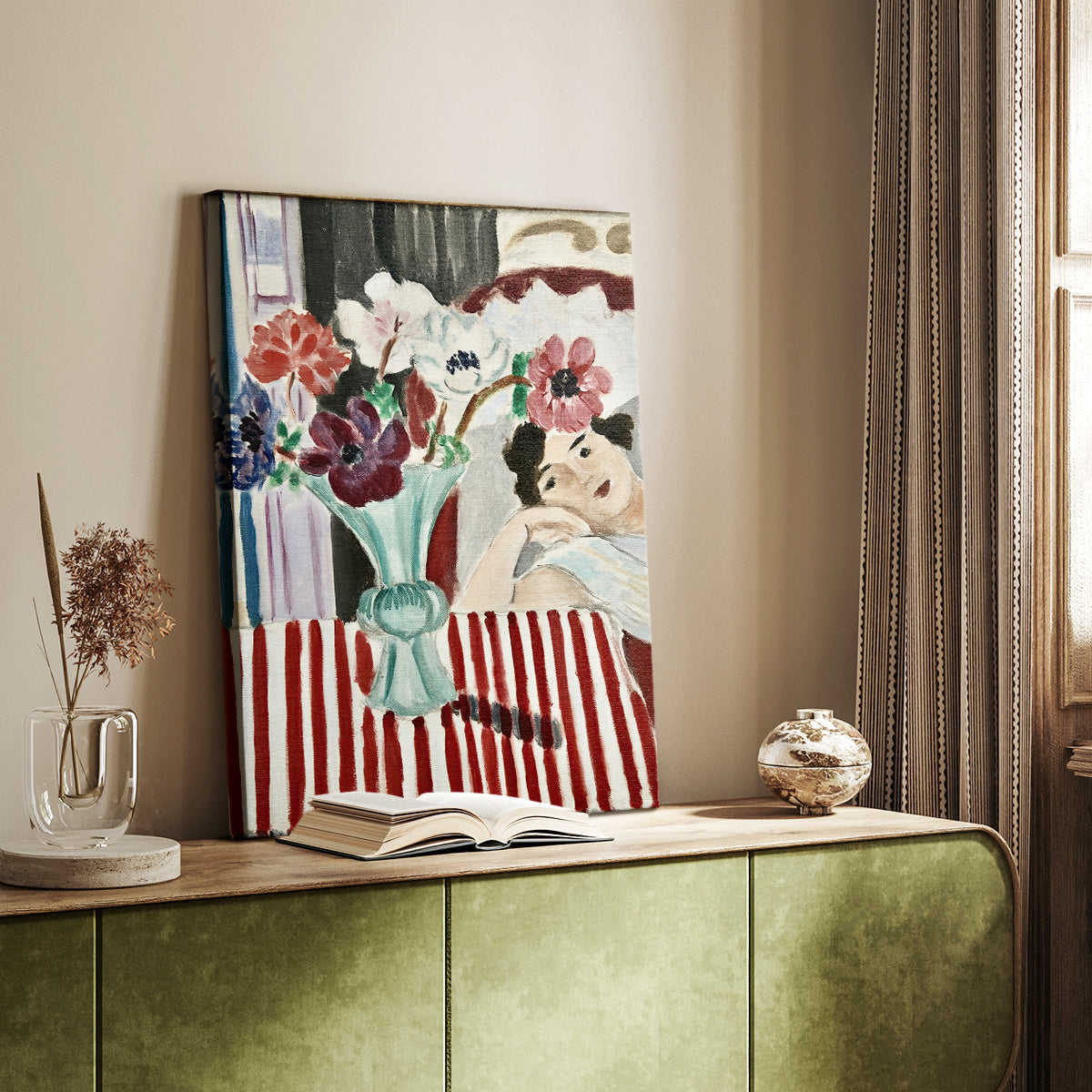 Canvas art print of a stylized figure with floral elements and vivid tones styled in a home decor setting.