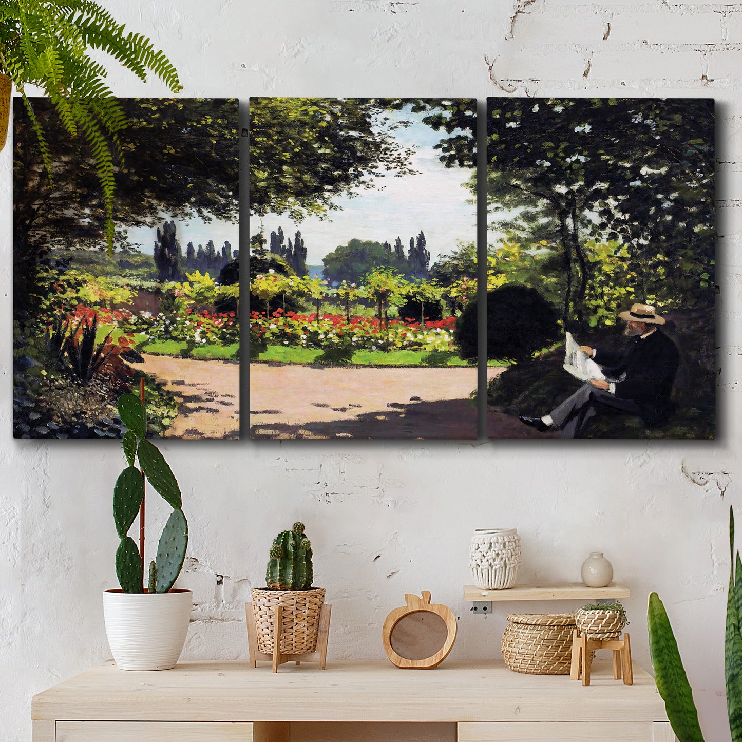 Three-panel canvas wall art featuring coastal garden overlooking sea, displayed in a boho-chic entryway above a console table.