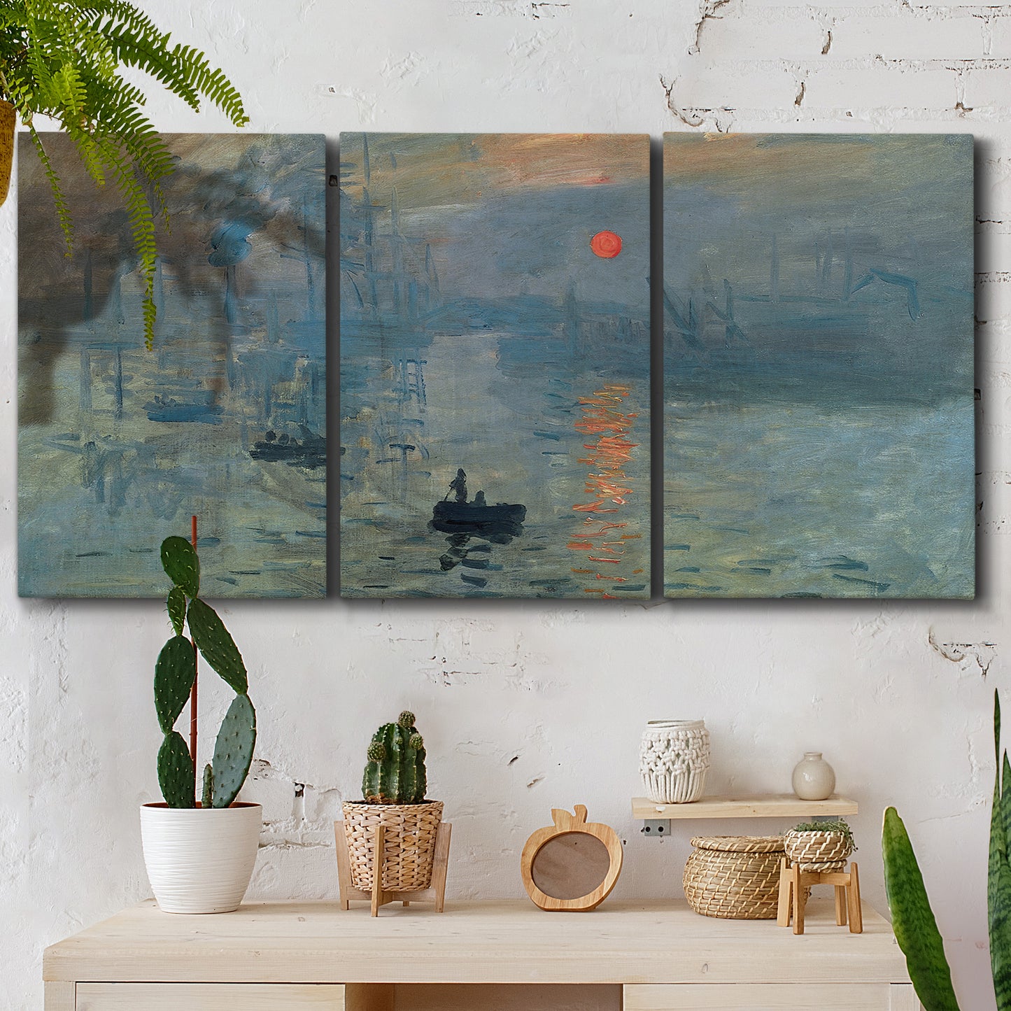 Three-panel canvas wall art featuring misty harbor sunrise with boats, displayed in a boho-chic entryway above a console table.
