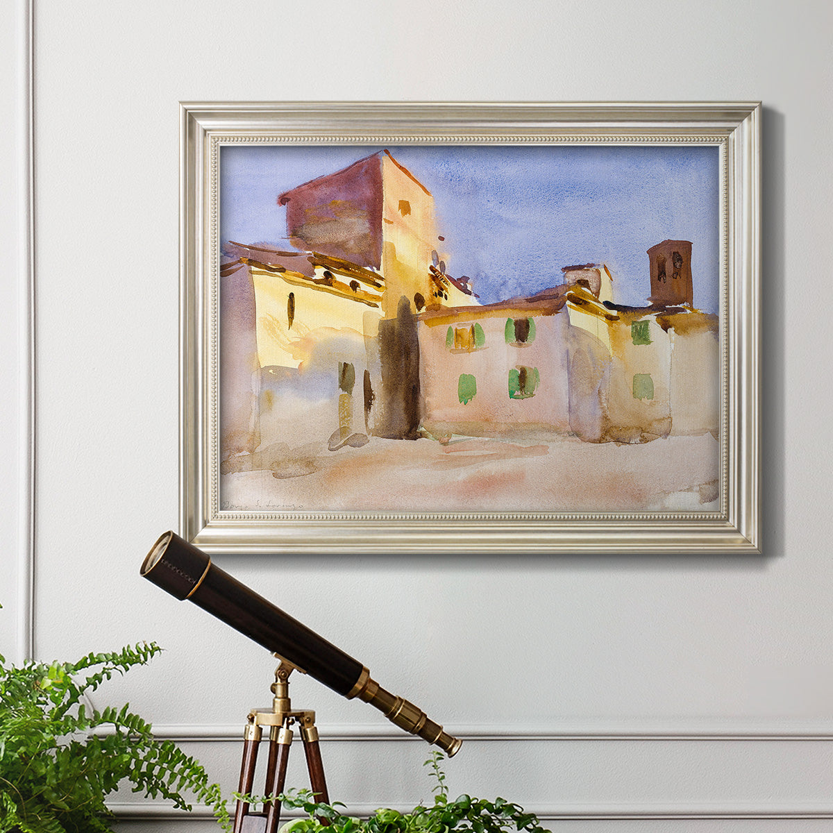 Impressionist Italian village scene by John Singer Sargent in an ornate champagne frame displayed in a light-toned interior setting.