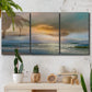 Three-panel canvas wall art featuring tranquil beach at sunset, displayed in a boho-chic entryway above a console table.