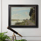 Impressionist river scene with red boats by Claude Monet in an ornate black frame with gilded inner detail displayed in a light-toned interior setting.