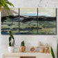 Three-panel canvas wall art featuring muted abstract landscape study, displayed in a boho-chic entryway above a console table.