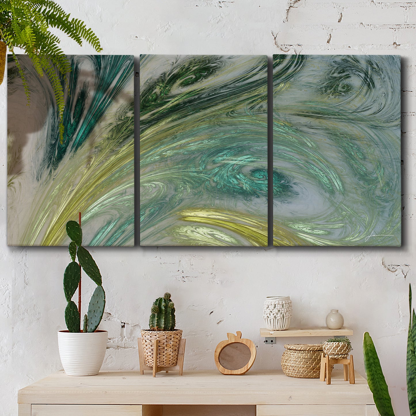 Three-panel canvas wall art featuring layered modern abstract landscape, displayed in a boho-chic entryway above a console table.