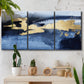 Three-panel canvas wall art featuring coastal shoreline with warm light, displayed in a boho-chic entryway above a console table.
