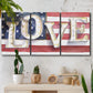 Three-panel canvas wall art featuring patriotic rustic typography art, displayed in a boho-chic entryway above a console table.