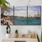 Three-panel canvas wall art featuring river basin with boats, displayed in a boho-chic entryway above a console table.